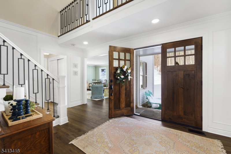 31 Warren Cutting Road Chester, NJ 07930 - Photo 3 of 37 a view of an entryway with wooden floor and windows