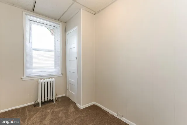 an empty room with a window