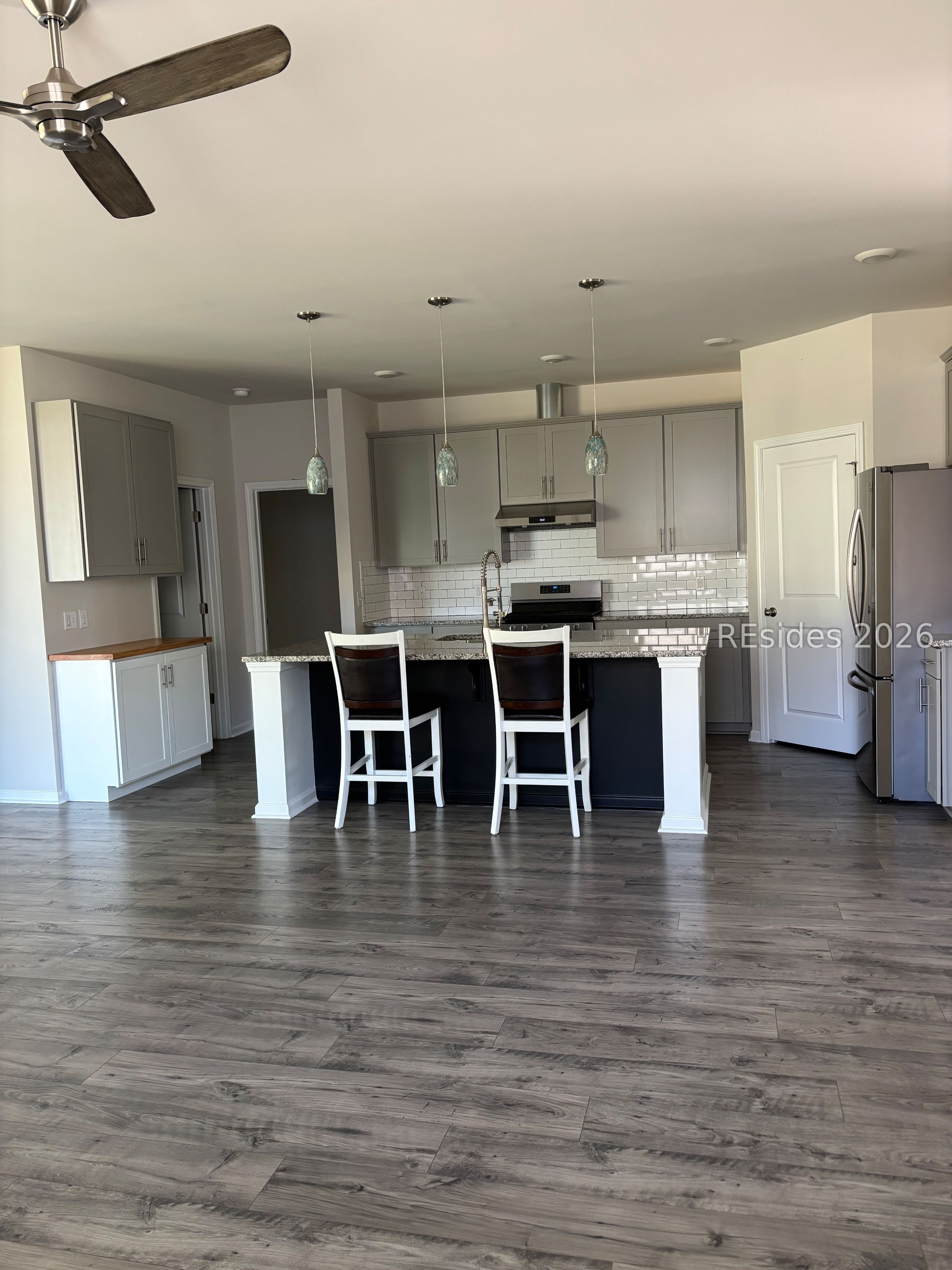 469 Rye Creek Circle Bluffton, SC 29909 - Photo 12 of 26 Chef's kitchen Island seating