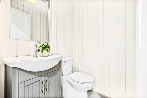 a view of a balcony with wooden floor