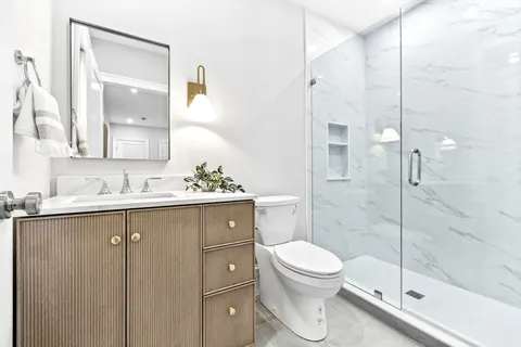 a view of a livingroom with wooden floor