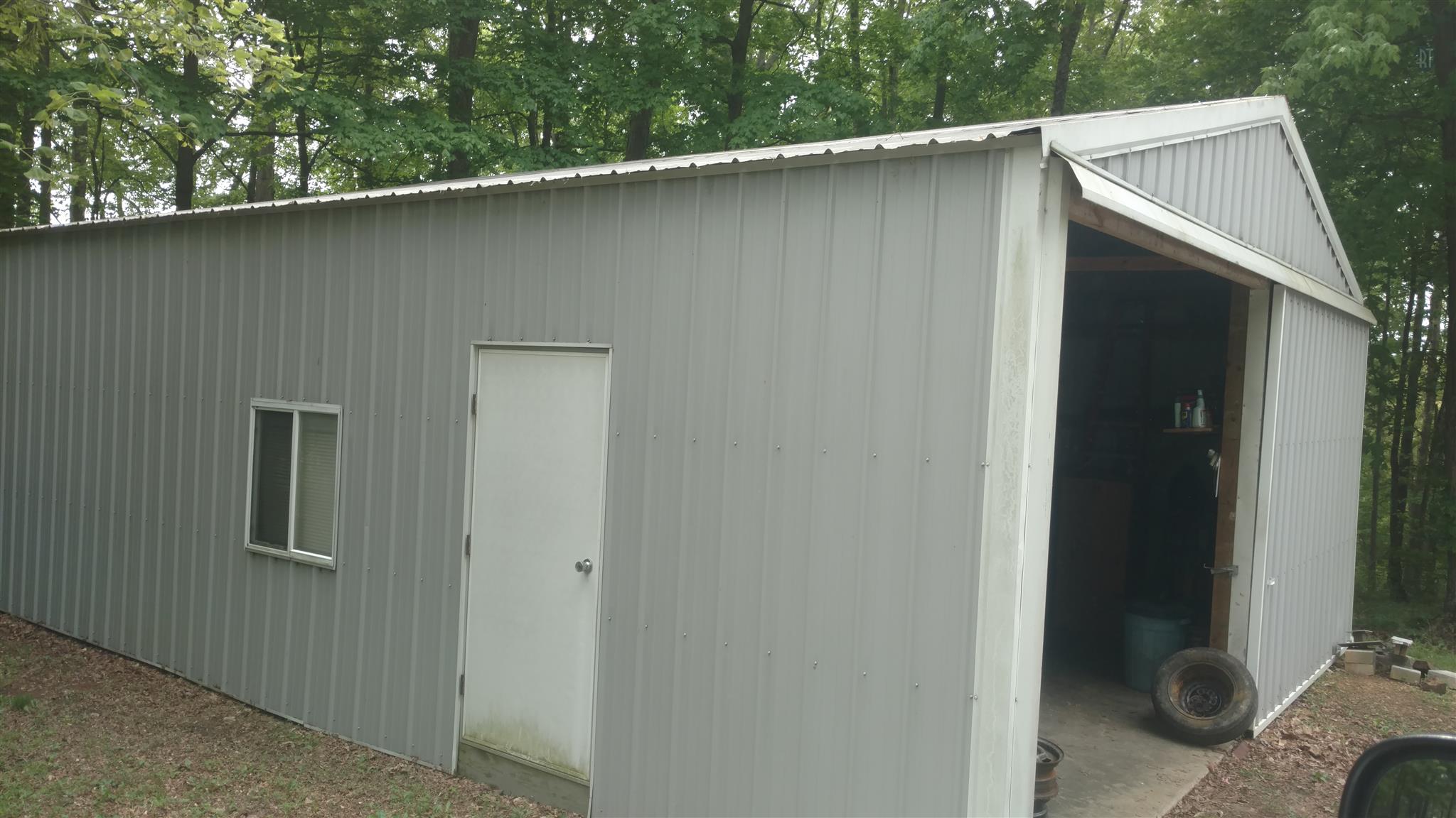 1374 Fowler Ford Road Portland, TN 37148 - Photo 4 of 6 24x30 with electricity and concrete floors