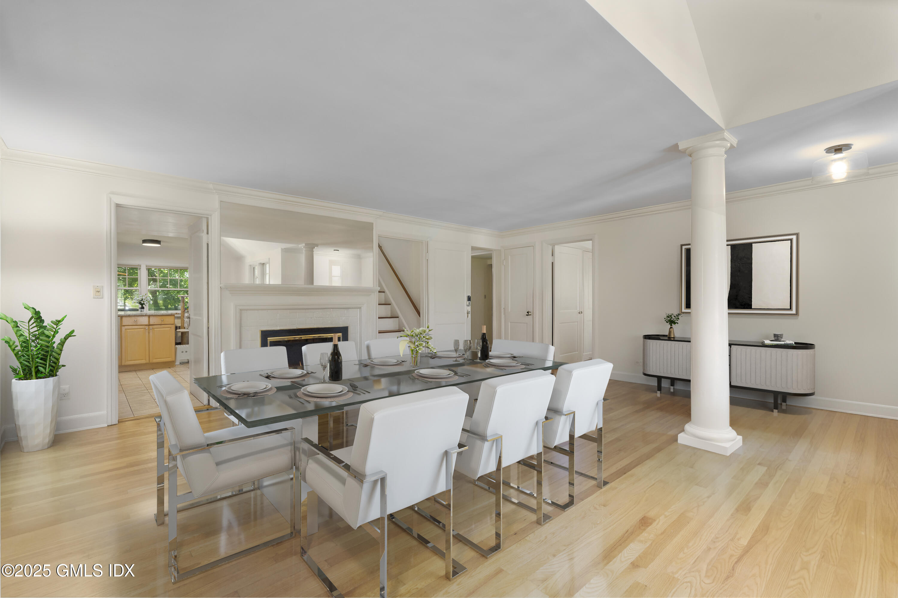 15 Ridge Road Cos Cob, CT 06807 - Photo 3 of 15 a living room with fireplace furniture and a wooden floor