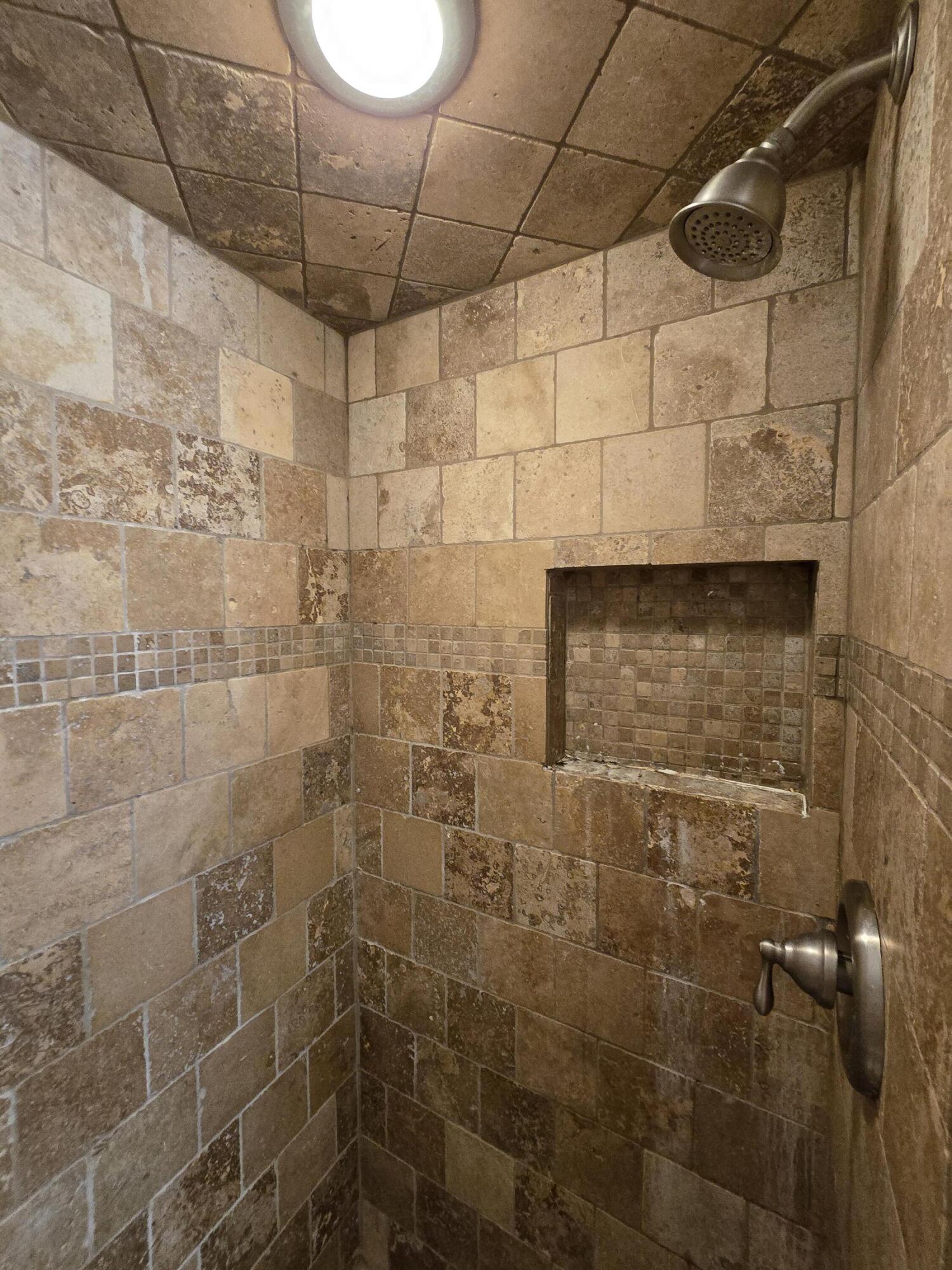 506 North 19th Street Lamesa, TX 79331 - Photo 9 of 29 a bathroom with a shower
