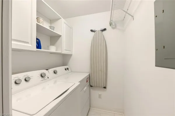 a bathroom with a sink and a machine