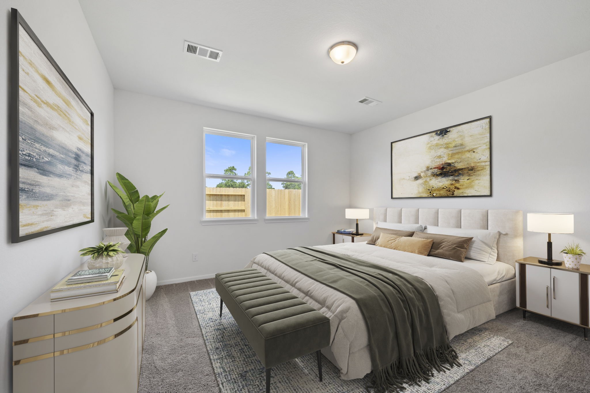 23619 Cinnamon Tree Lane Katy, TX 77493 - Photo 12 of 33 a bedroom with a bed and a potted plant on a dresser