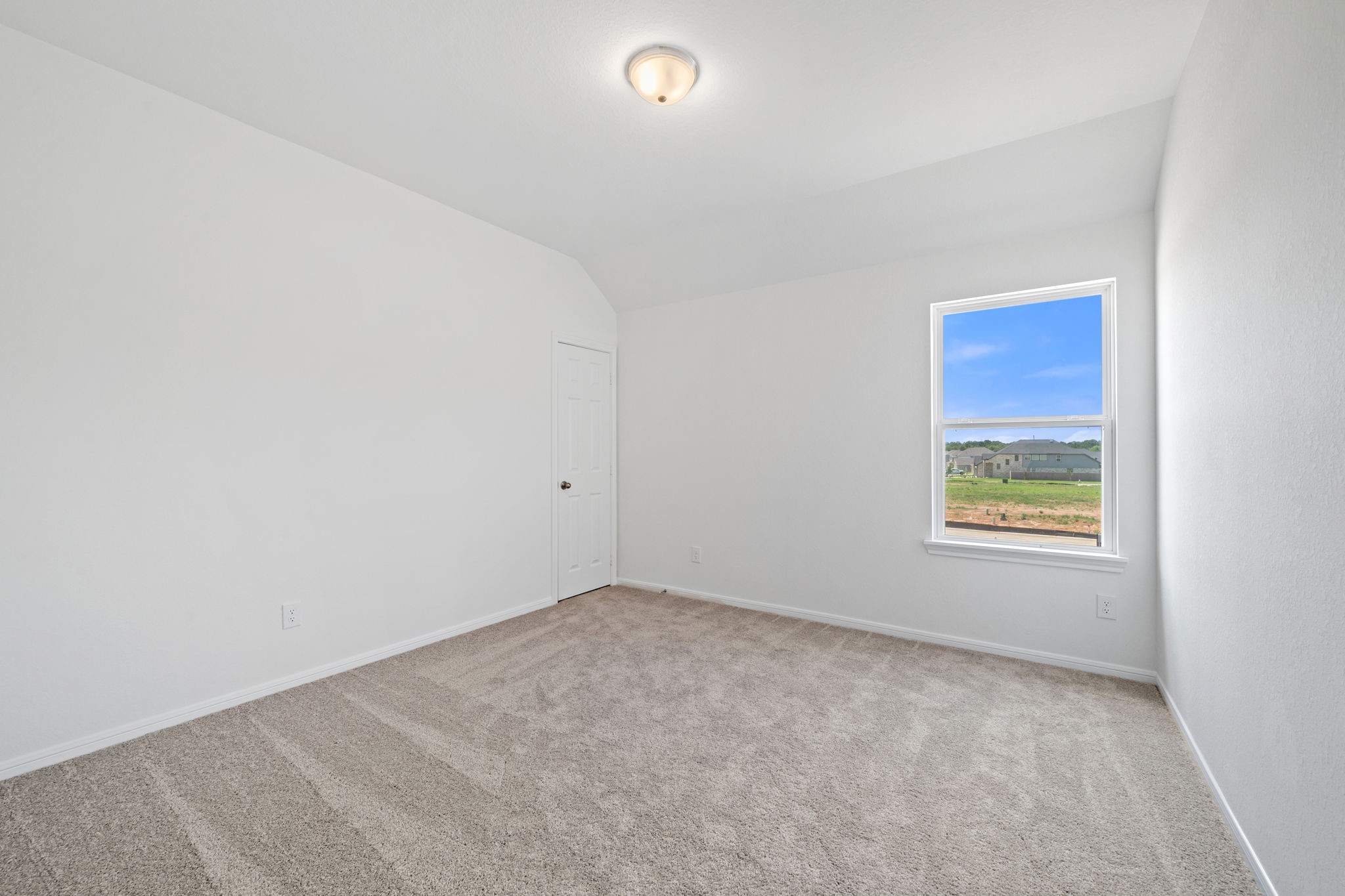 23619 Cinnamon Tree Lane Katy, TX 77493 - Photo 17 of 33 an empty room with a window