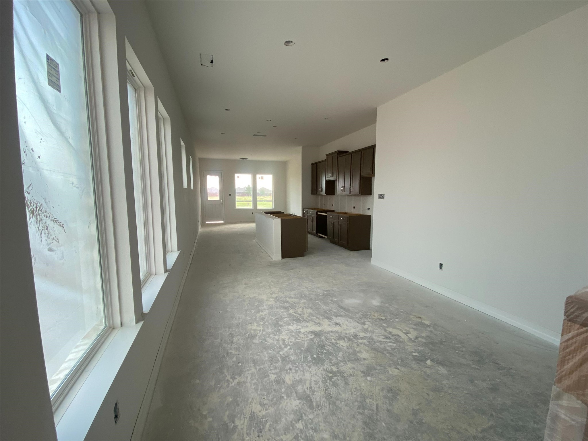 23619 Cinnamon Tree Lane Katy, TX 77493 - Photo 20 of 33 a view of a hallway to kitchen and dining room