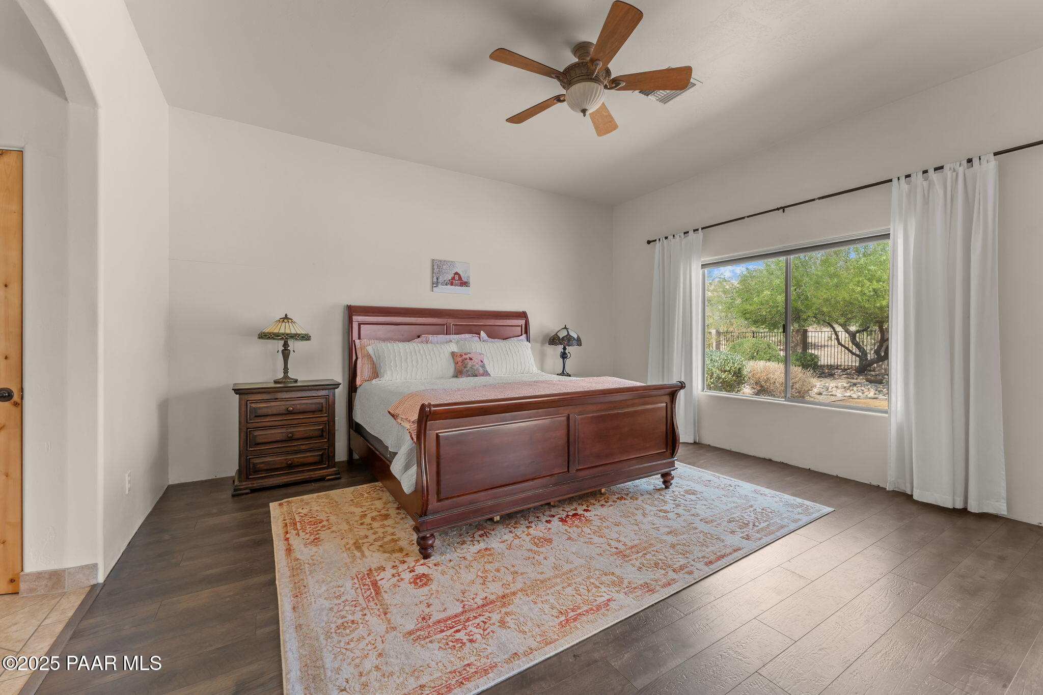 2100 West Silverlode Drive Wickenburg, AZ 85390 - Photo 22 of 51 a bedroom with a bed and a window
