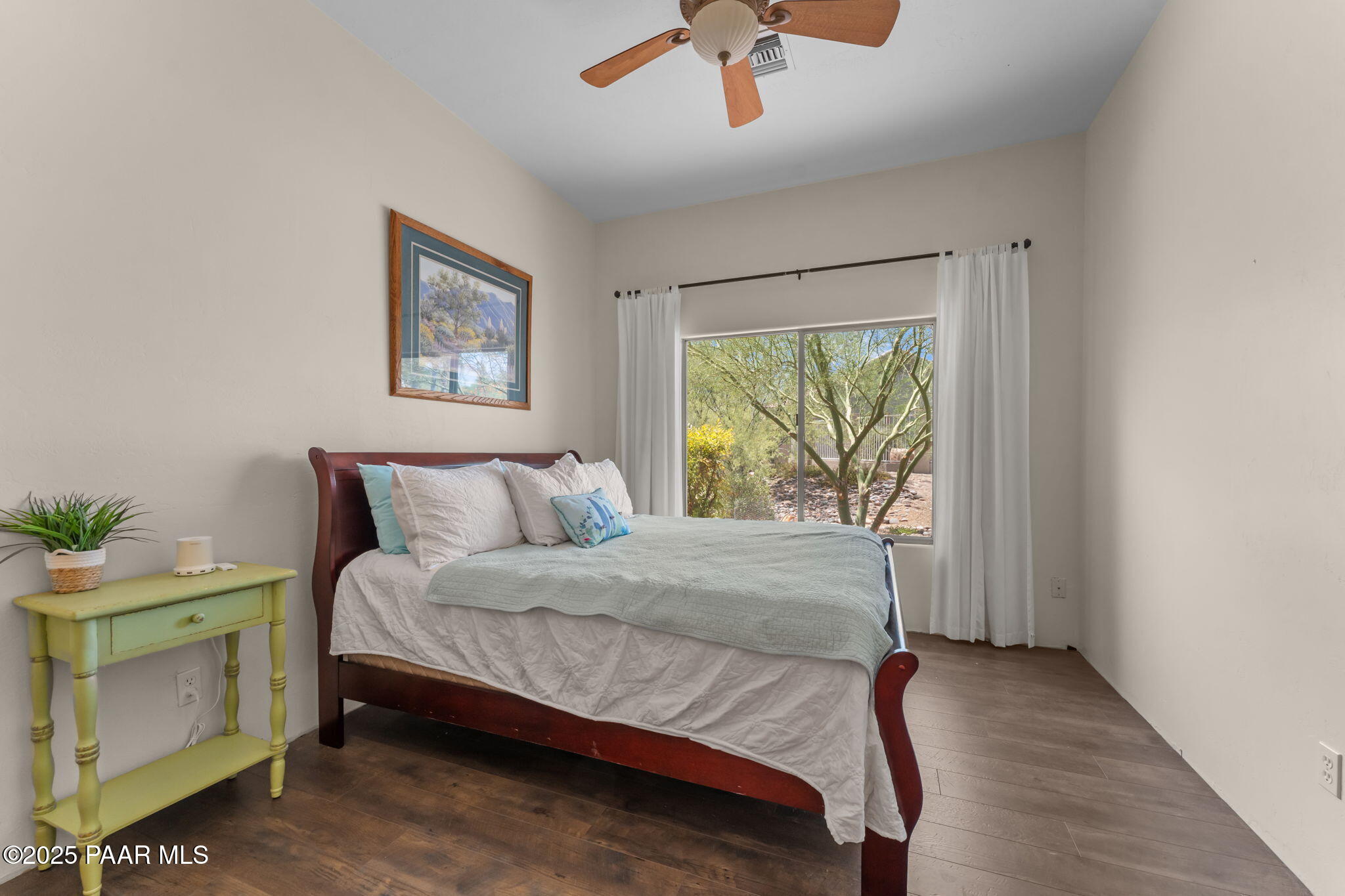 2100 West Silverlode Drive Wickenburg, AZ 85390 - Photo 28 of 51 a bedroom with a bed and a window