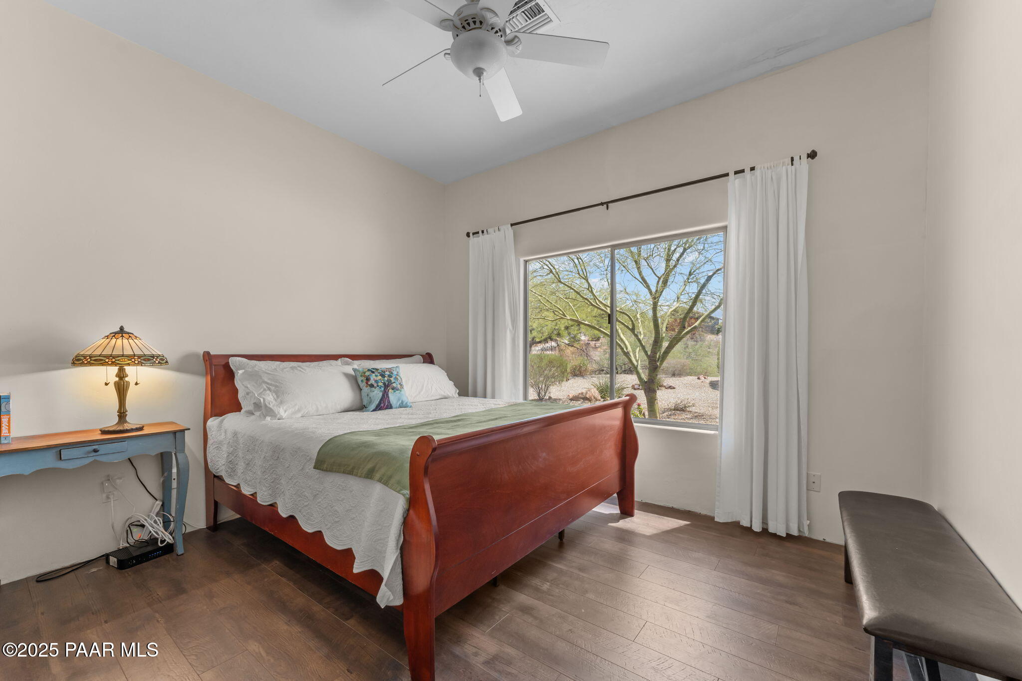 2100 West Silverlode Drive Wickenburg, AZ 85390 - Photo 30 of 51 a bedroom with a bed and a window