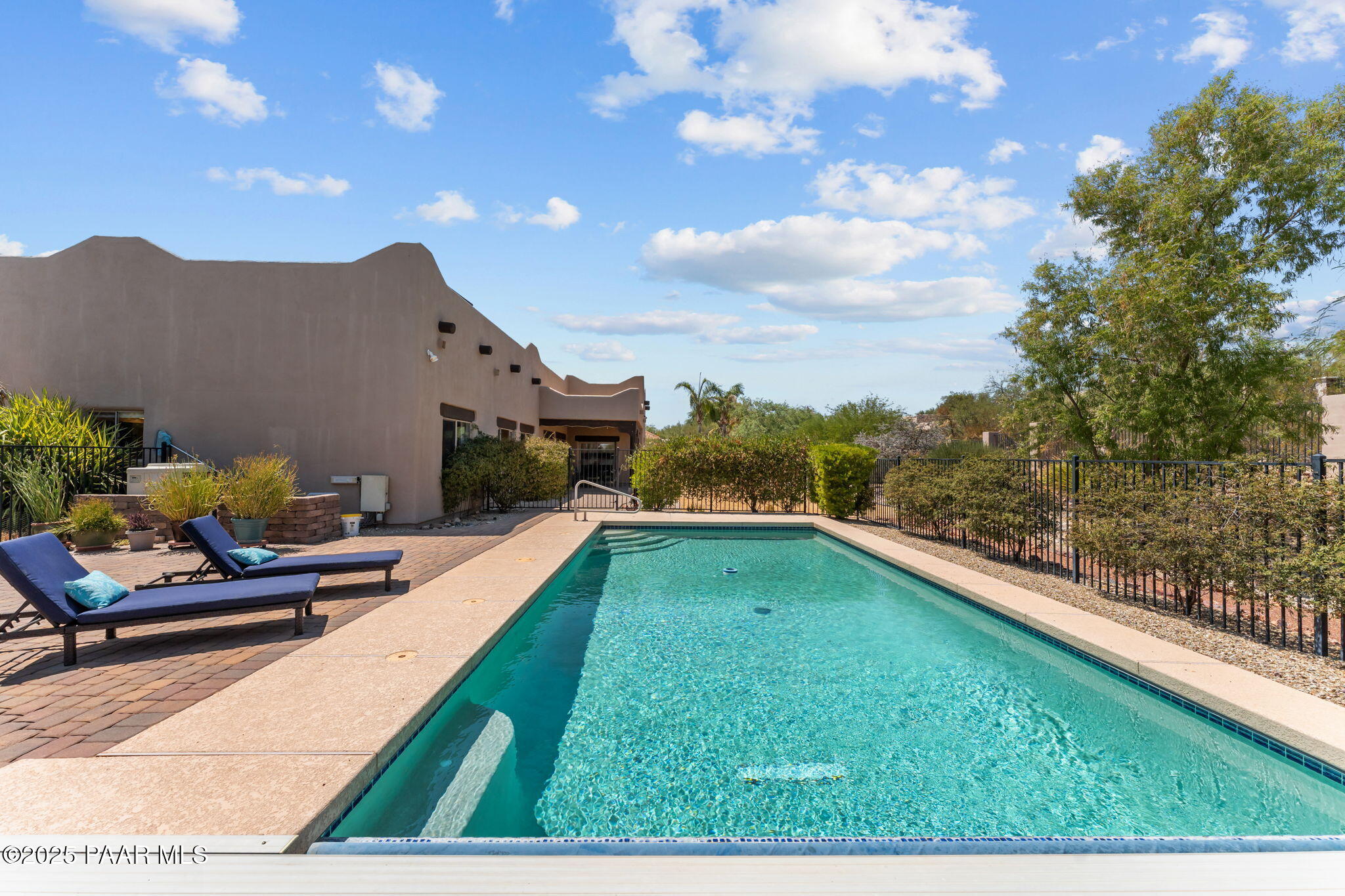2100 West Silverlode Drive Wickenburg, AZ 85390 - Photo 3 of 51 a view of a terrace with a garden
