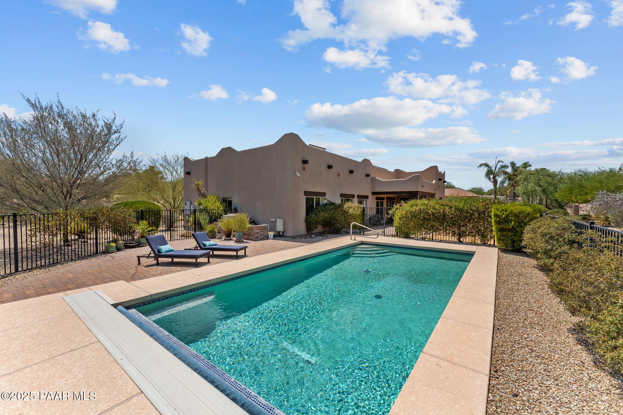 2100 West Silverlode Drive Wickenburg, AZ 85390 - Photo 38 of 51 a view of a garden with sitting area