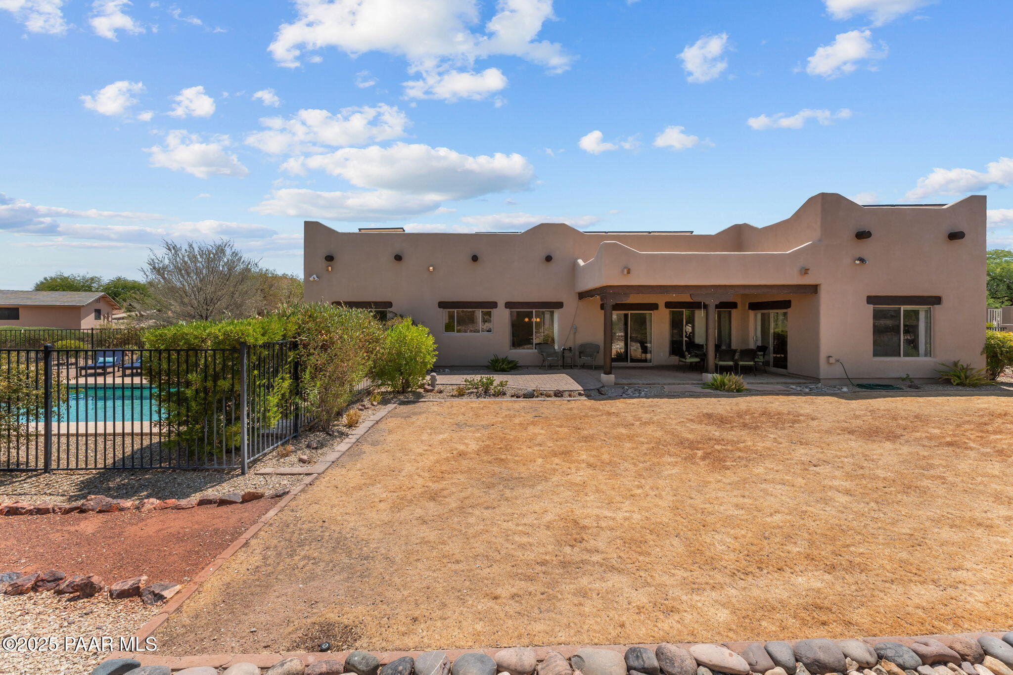 2100 West Silverlode Drive Wickenburg, AZ 85390 - Photo 39 of 51 a view of a house with a yard