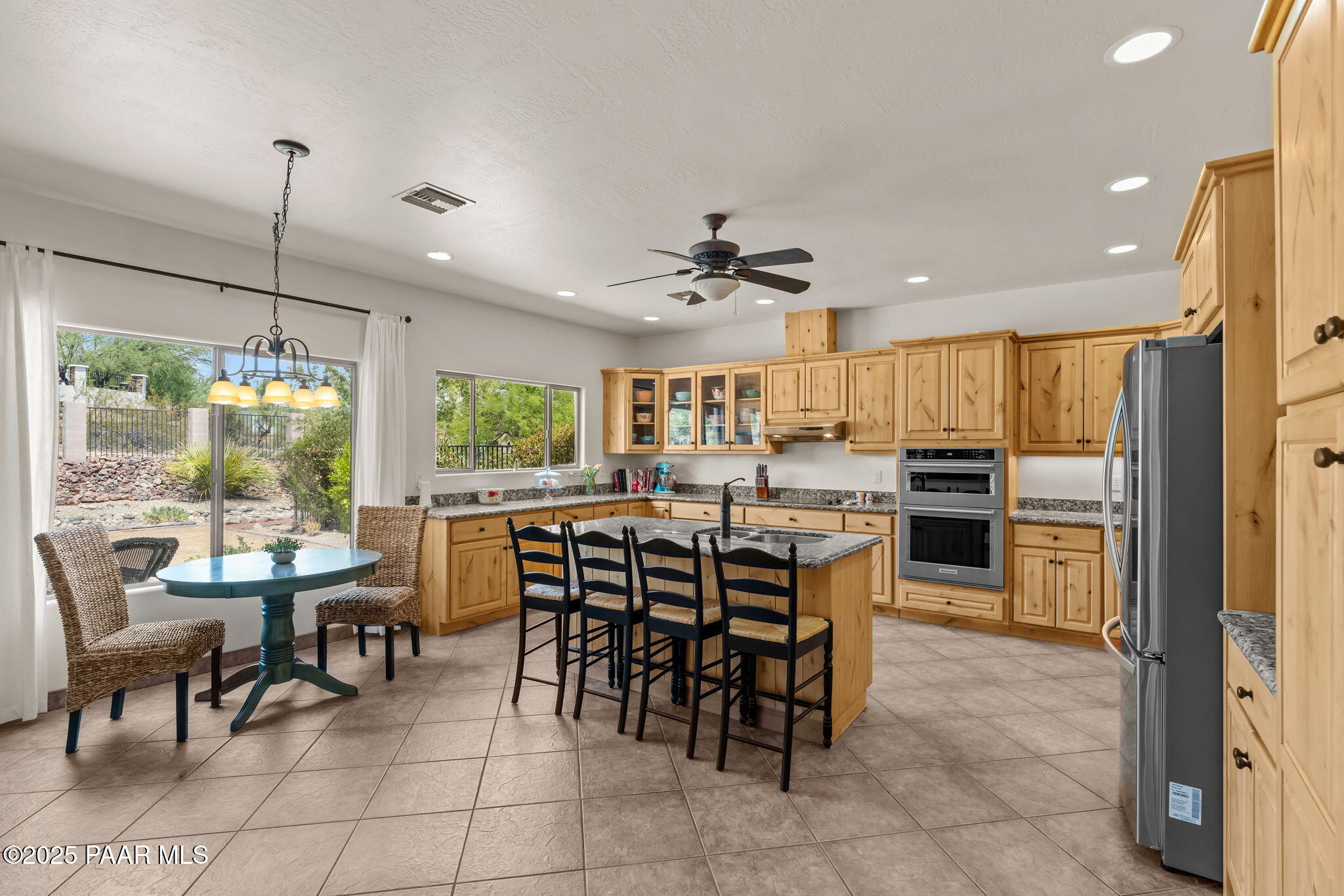 2100 West Silverlode Drive Wickenburg, AZ 85390 - Photo 4 of 51 a view of a dining room and livingroom view