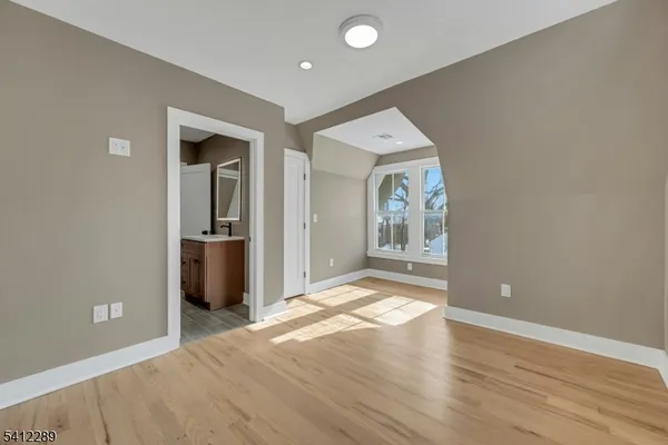 a view of livingroom with furniture and wooden floor