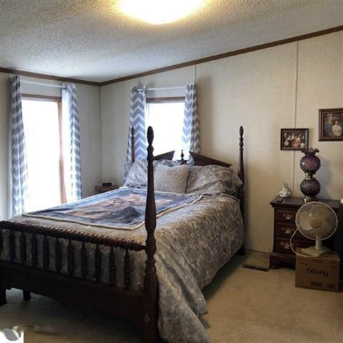 3085 North 3 1/4 Road Mesick, MI 49668 - Photo 13 of 18 3085 bedroom