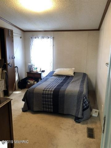 3085 North 3 1/4 Road Mesick, MI 49668 - Photo 14 of 18 3085 bedroom2