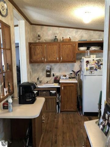 3085 North 3 1/4 Road Mesick, MI 49668 - Photo 6 of 18 3085 kitchen2