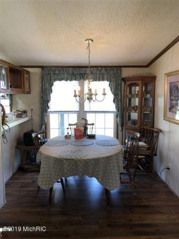 3085 North 3 1/4 Road Mesick, MI 49668 - Photo 8 of 18 3085 dining area
