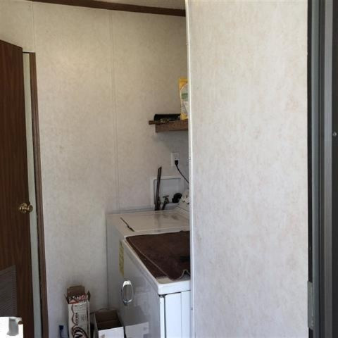 3085 North 3 1/4 Road Mesick, MI 49668 - Photo 9 of 18 3085 laundry