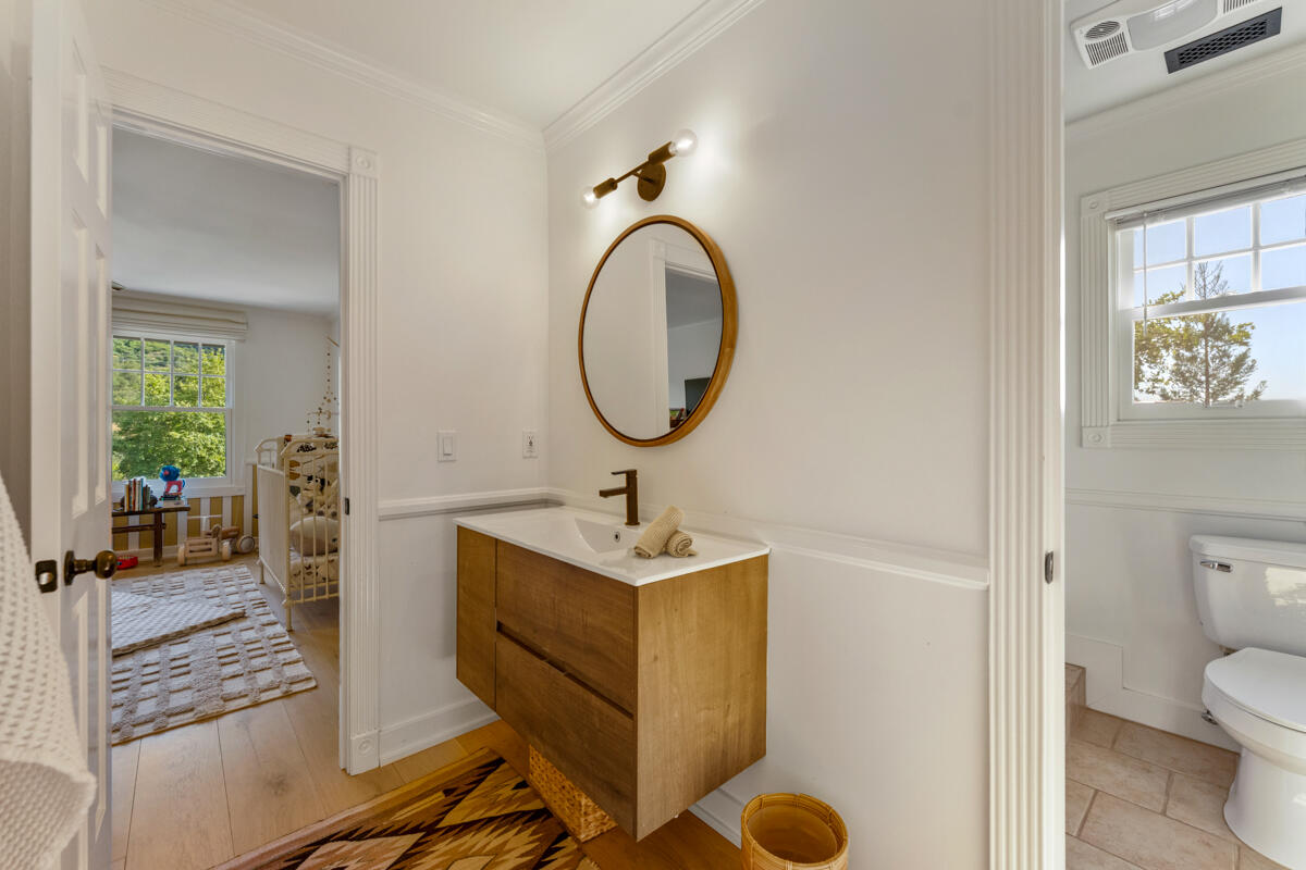 13100 Ojai Road Santa Paula, CA 93060 - Photo 28 of 60 a bathroom with a sink toilet and a mirror