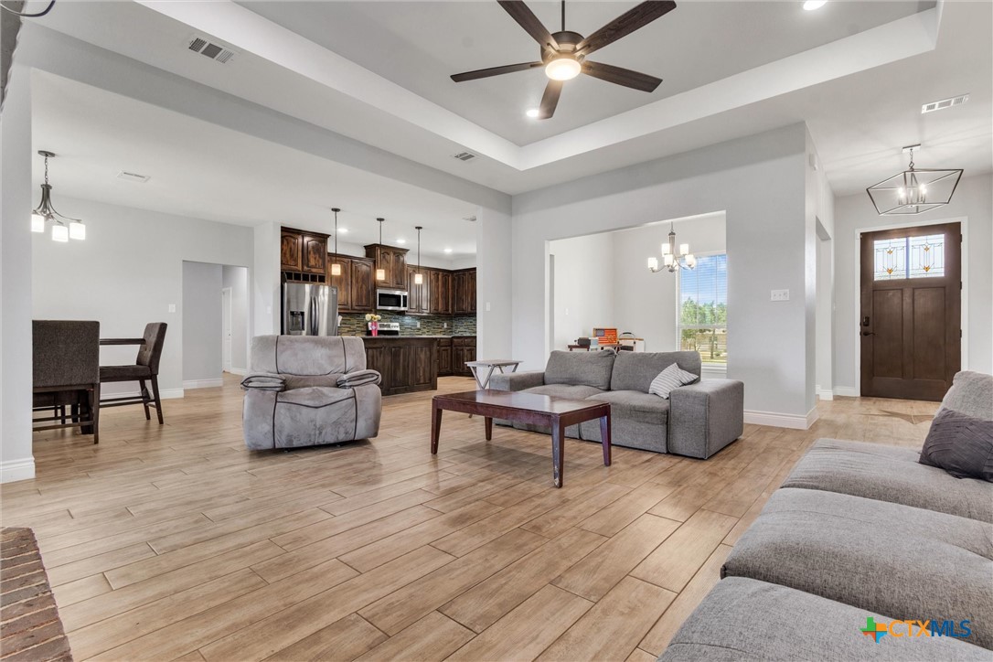 3919 Gracey Lane Kempner, TX 76539 - Photo 15 of 44 a living room with furniture and a wooden floor