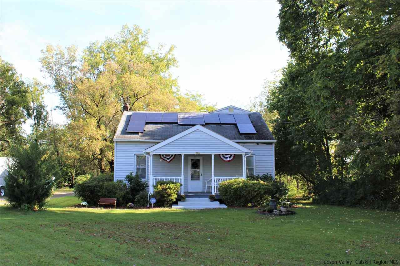 170 Samsonville Road Kerhonkson, NY 12446 - Photo 1 of 35 a front view of a house with a garden and yard