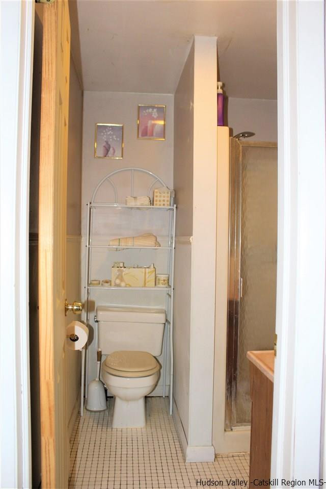 170 Samsonville Road Kerhonkson, NY 12446 - Photo 22 of 35 a bathroom with a toilet and a shower