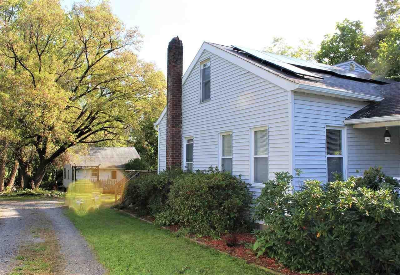 170 Samsonville Road Kerhonkson, NY 12446 - Photo 29 of 35 a front view of a house with a garden and trees