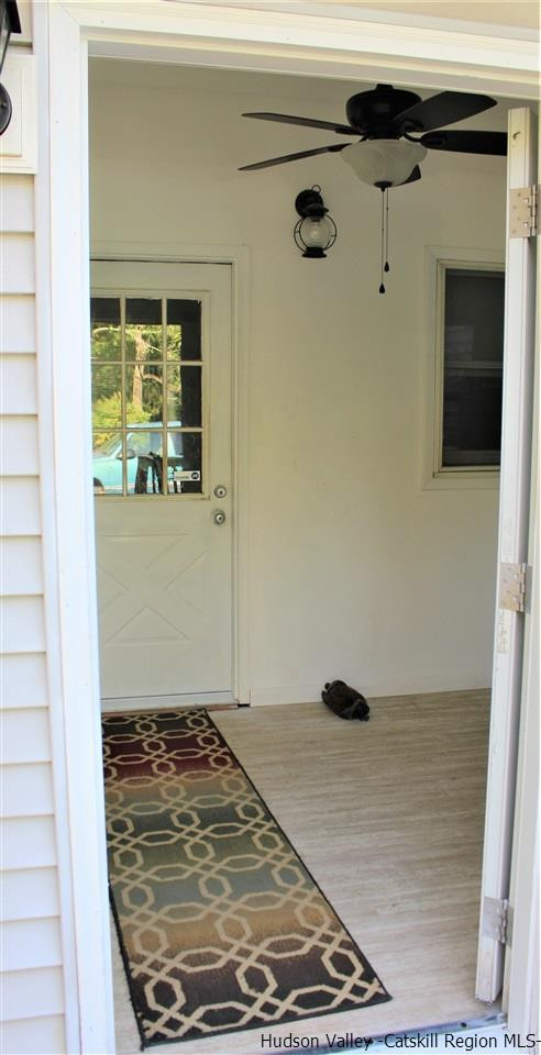 170 Samsonville Road Kerhonkson, NY 12446 - Photo 31 of 35 a view of a livingroom with wooden floor and front door