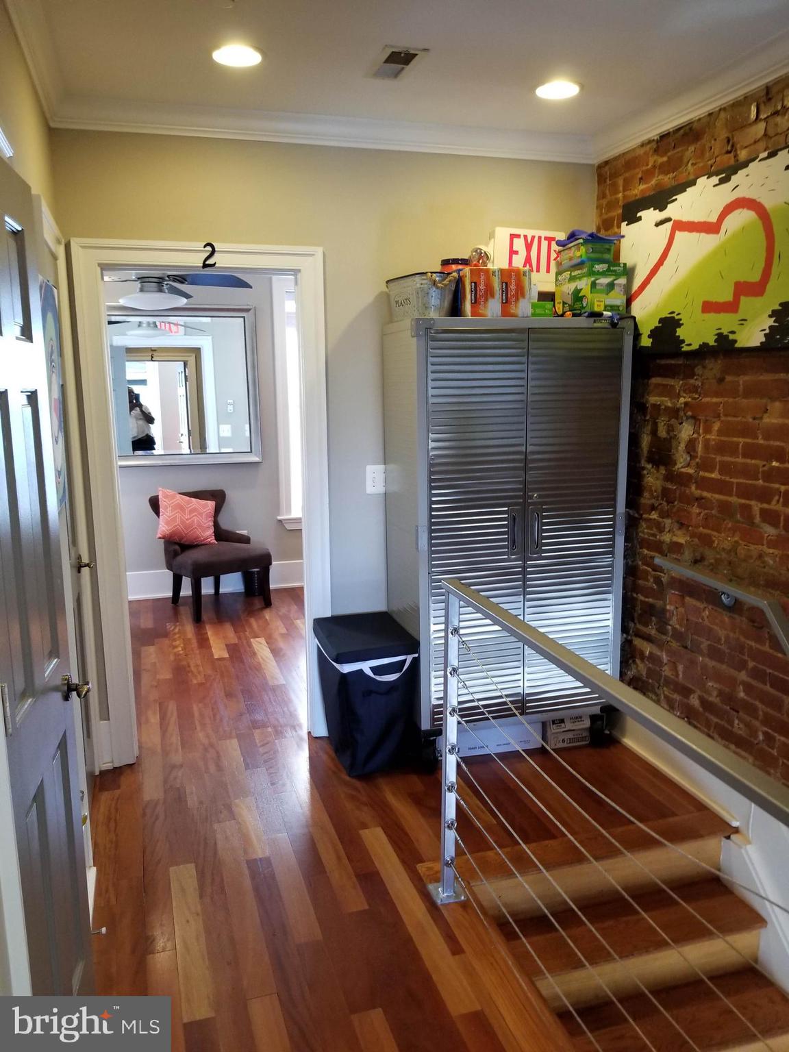 1203 U Street Northwest Washington, DC 20009 - Photo 25 of 40 a living room with furniture and a flat screen tv