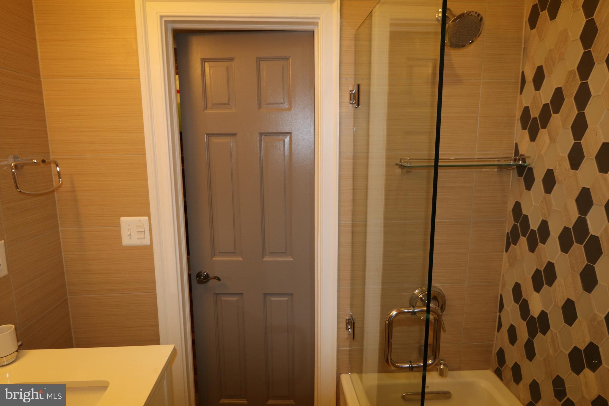 1203 U Street Northwest Washington, DC 20009 - Photo 28 of 40 a bathroom with a shower and a sink