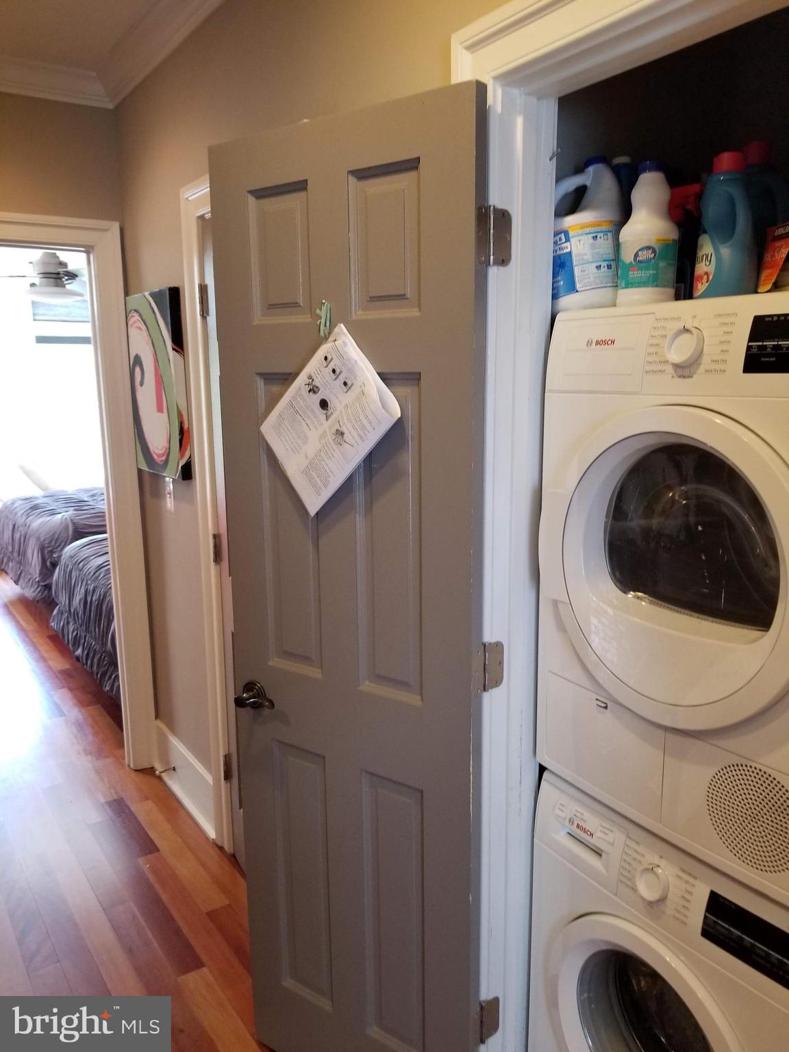 1203 U Street Northwest Washington, DC 20009 - Photo 29 of 40 a view of a hallway with washer and dryer