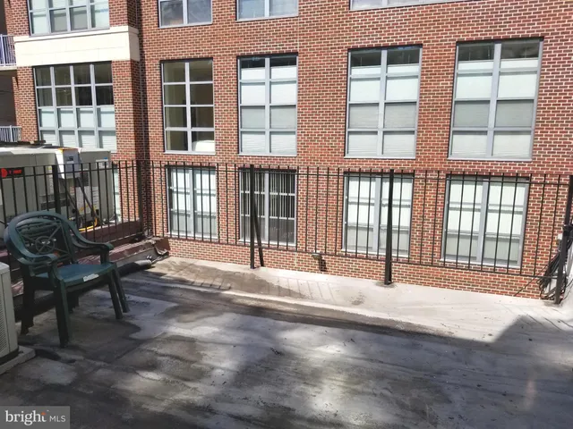 a view of a building with a bench