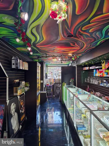 a view of a chairs and table in the balcony