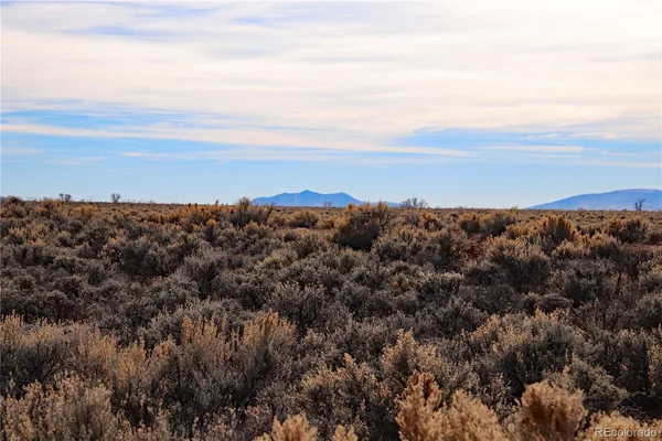 a view of an outdoor space and mountain view