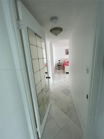 a kitchen with a sink and a stove top oven