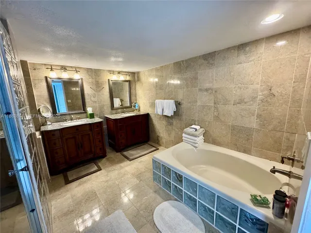 a view of a large hall with wooden floor