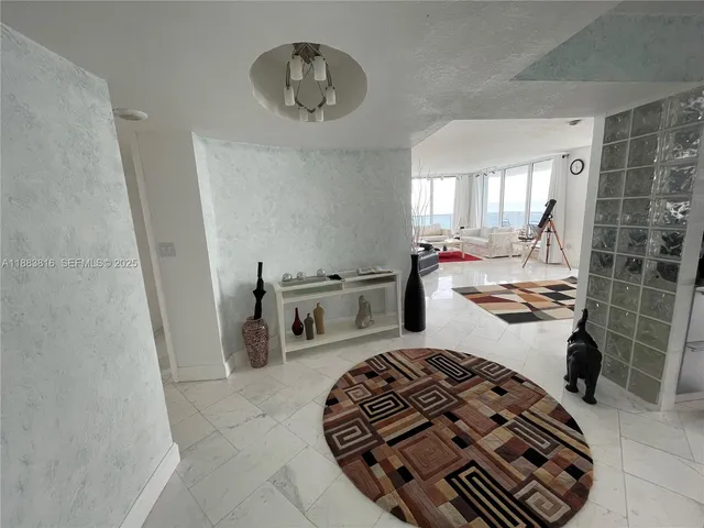 a bathroom with a tub a double vanity sink and mirror