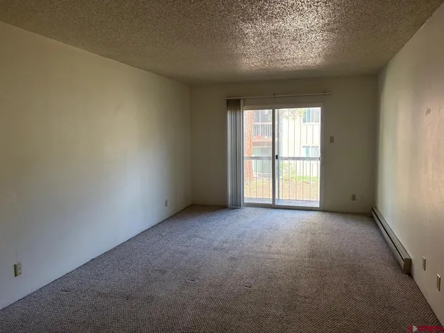 a kitchen with a stove and a microwave
