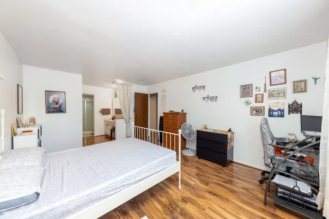 a bedroom with a bed and furniture