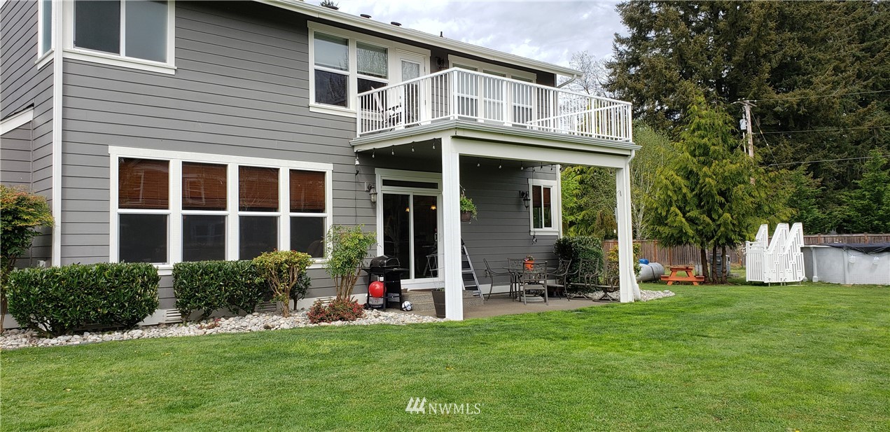 17834 Kenworth Lane Southwest Rochester, WA 98579 - Photo 2 of 29 a front view of a house with a yard