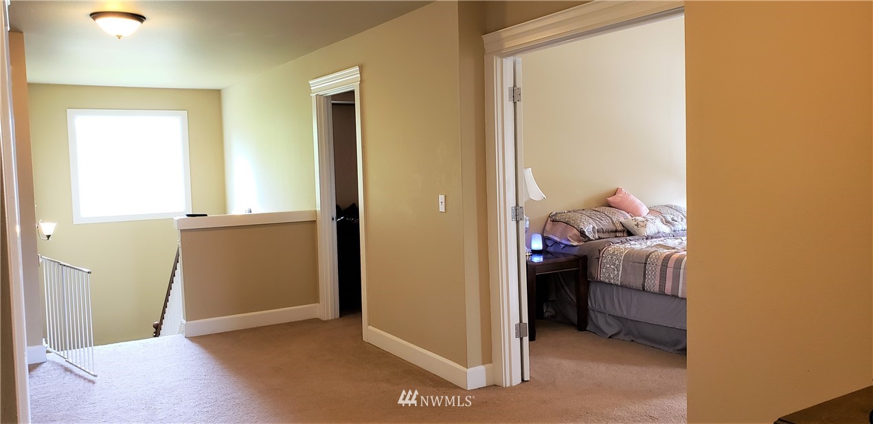 17834 Kenworth Lane Southwest Rochester, WA 98579 - Photo 13 of 29 a view of a bedroom from a hallway
