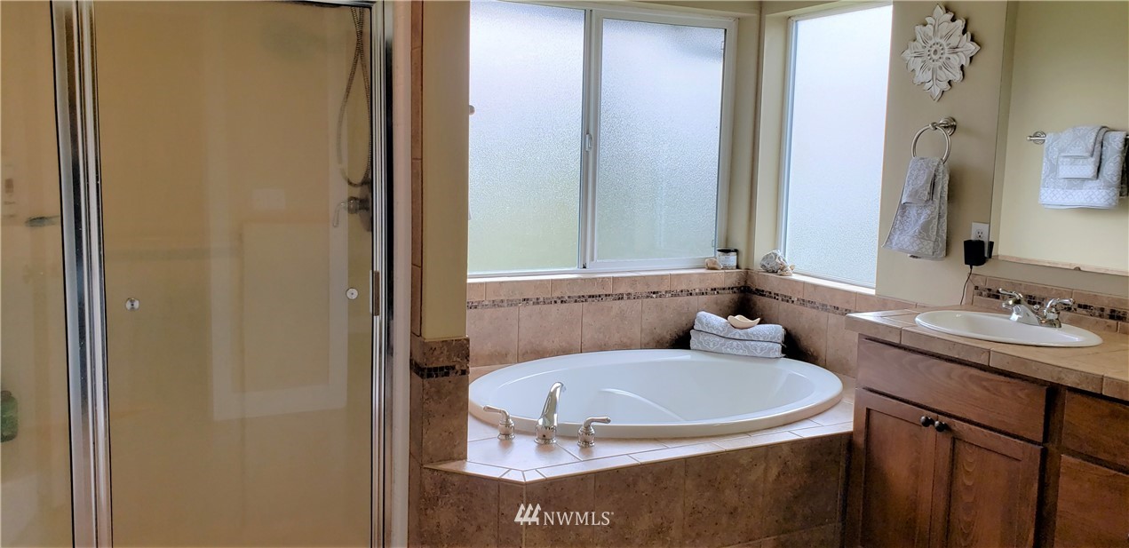 17834 Kenworth Lane Southwest Rochester, WA 98579 - Photo 16 of 29 a bathroom with a sink and a mirror