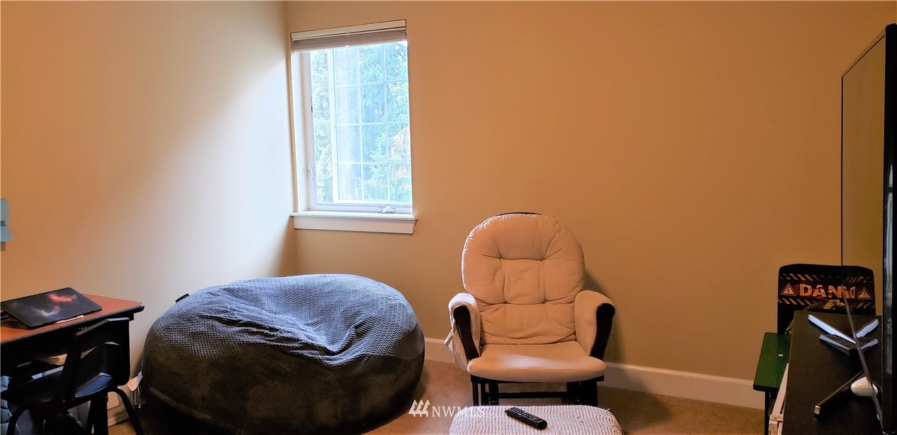 17834 Kenworth Lane Southwest Rochester, WA 98579 - Photo 20 of 29 a view of a room with furniture and a window