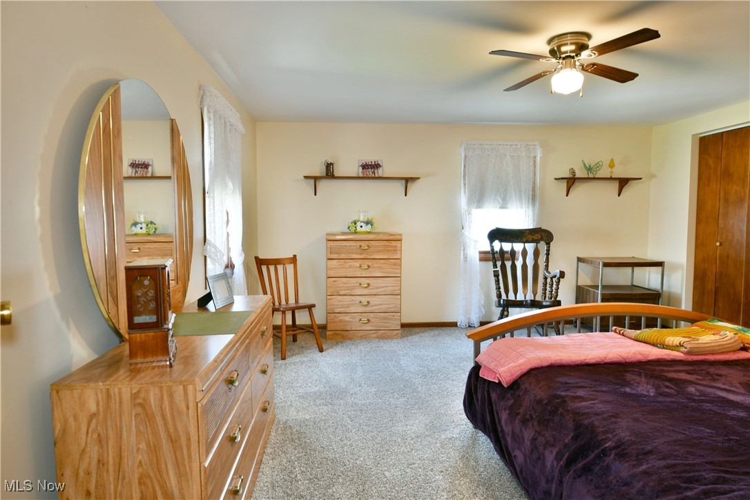 1509 State Road Northwest Warren, OH 44481 - Photo 35 of 49 Carpeted bedroom featuring ceiling fan