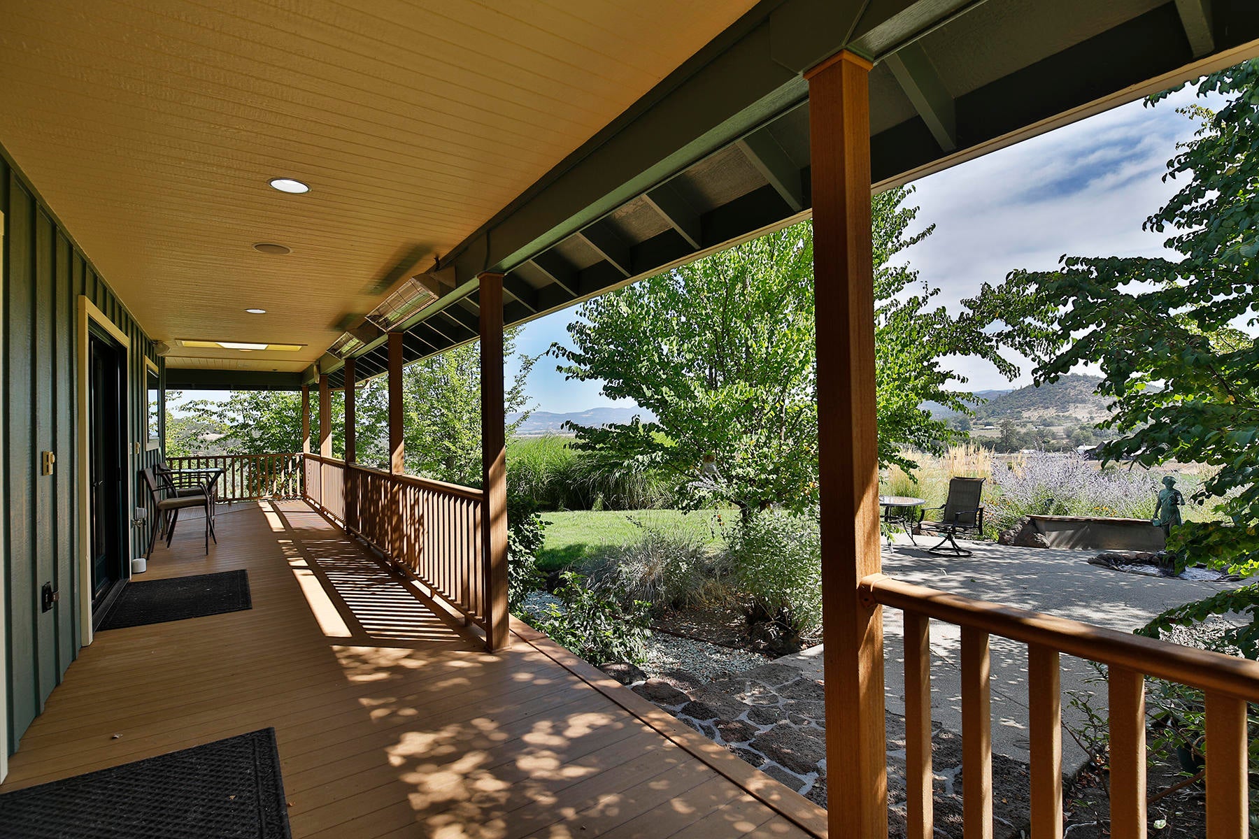 1524 Dry Creek Road Eagle Point, OR 97524 - Photo 33 of 50 Rap around covered porch has heaters