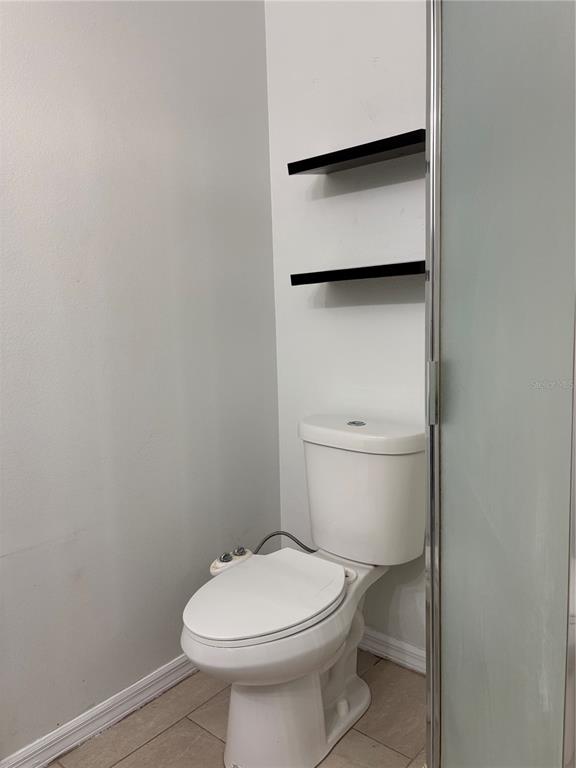 673 Eldron Avenue Deltona, FL 32738 - Photo 16 of 21 a bathroom with a toilet