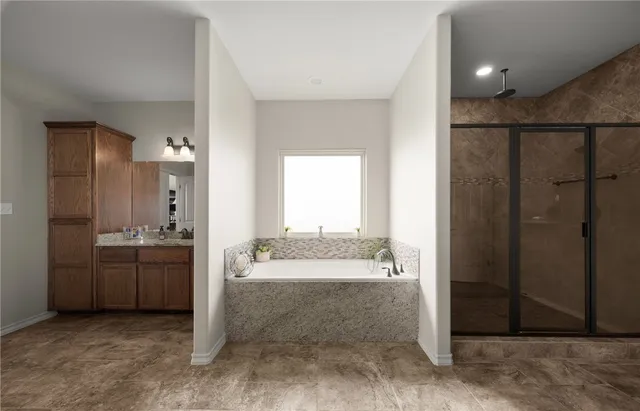 a view of a bathroom with tub shower